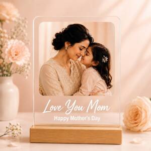 Mom acrylic photo frame with example photograph and wording on its pinewood stand